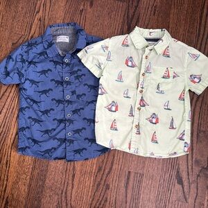 Two bottom down short sleeve shirts. Toddler boy size 5-6
